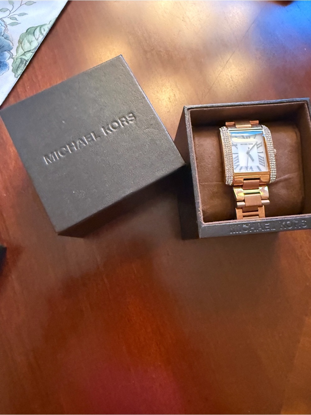 Michael Kors Rose Gold and White Rectangular Crystal-Trim women’s watch.